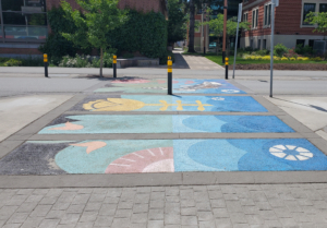A photo of the McAllister crosswalk looking towards the Outlet building.